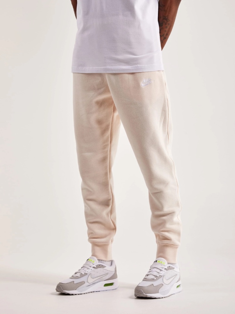 NIKE Club Fleece Jogger Pants in Guava Ice